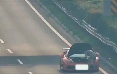 Watch A Lamborghini Huracan Get Smashed By SUV After Breaking Down In The Fast Lane - carscoops.com - China