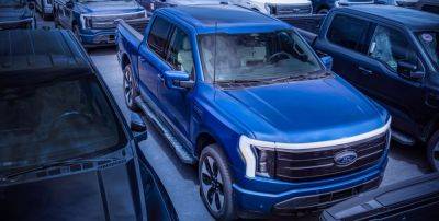 Ford - Ford Reportedly Plans to Halve F-150 Lightning Production - caranddriver.com - state Michigan - county Dearborn