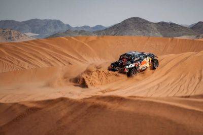 Carlos Sainz - Dakar 2024: Local favourite in the overall lead, Loeb takes stage win - carmag.co.za - Brazil - city Dakar