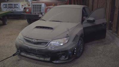 Watch This Filthy Subaru WRX Get Pulled From A Barn And Detailed Back To Life - motor1.com