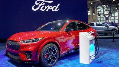 Ford - Ford cuts prices of electric Mustang Mach-E by up to $8,100 - foxbusiness.com - China - state California - state Michigan - county Dearborn