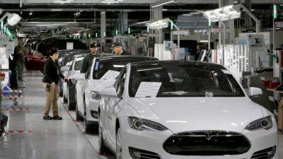 Ford - Tesla workers still make less than those at Ford and GM, despite recent raises - autoblog.com - city Detroit