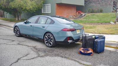 BMW i5 Luggage Test: How much fits in the trunk? - autoblog.com