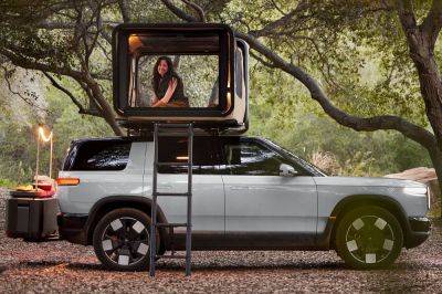 2026 Rivian R2 Coming With Movie Projector In Rooftop Tent - carbuzz.com