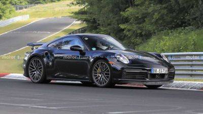Oliver Blume - The Porsche 911 Hybrid Debuts Early This Summer - motor1.com