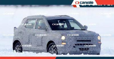 Mahindra XUV400 test mule hints at changes inside and out - carwale.com - India