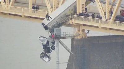 Driver Rescued After Crash Leaves Her Semi Truck Hanging off a Bridge - thedrive.com - state Indiana - state Ohio - state Kentucky - county George