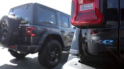 Hybrid vehicle sales revving up as EV demand sputters