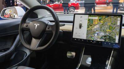 Tesla slashes price for Full Self-Driving software