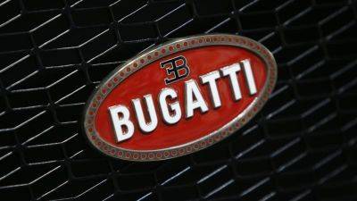 Bugatti Chiron successor prototype spotted in full profile under camo - autoblog.com