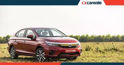 Honda City hybrid variant range and prices in India revised - carwale.com - India - city Honda - county Brown