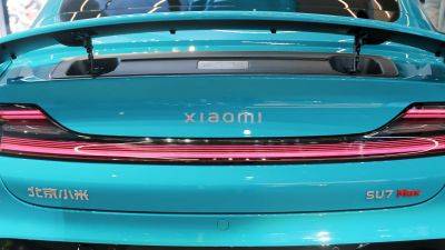 Lei Jun - Xiaomi moves ahead with Tesla-like SUV as its first EV is a hit - autoblog.com - China - county Green - city Beijing