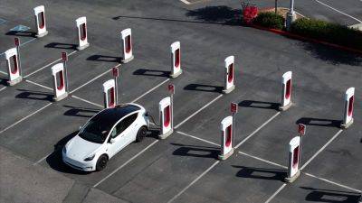 Elon Musk - Tesla rehires some Supercharger workers weeks Musk cut them - autoblog.com