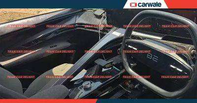 Tata Curvv - Production-spec Mahindra BE.05 Interior spied - carwale.com - India