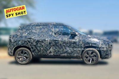 Nissan Magnite facelift new spy shots show design tweaks - autocarindia.com - India