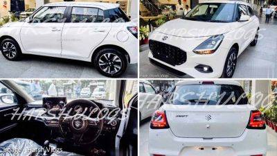 New Maruti Swift Arrives At Dealer Showroom – Exteriors, Interiors, Boot Space Detailed