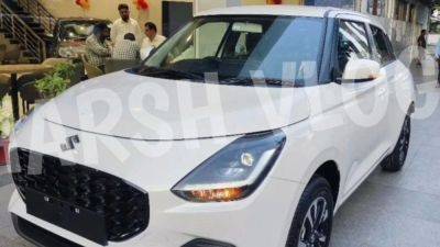 2024 Maruti Suzuki Swift starts arriving at dealerships. Check real-world images - auto.hindustantimes.com